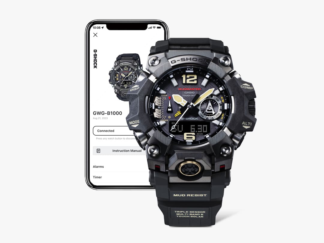 El reloj Bluetooth® Casio G-Shock GWG-B1000-1A, detrás: un smartphone con pantalla conectada e información sobre el reloj