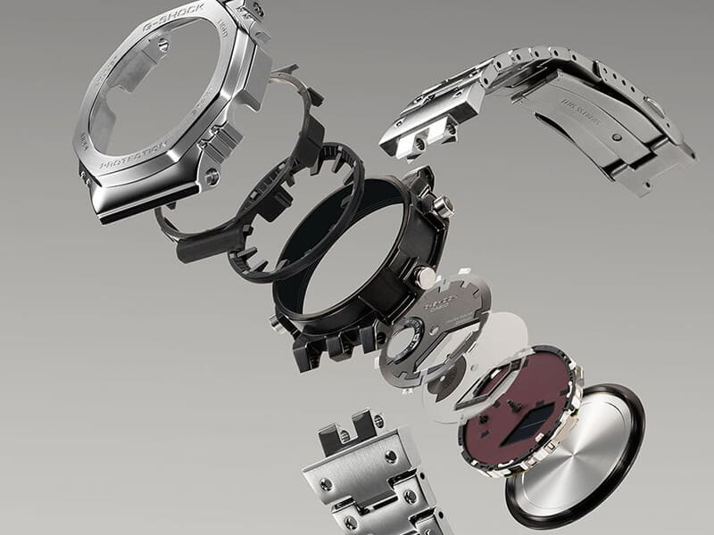  Os componentes individuais do relógio Casio G-Shock GM-B2100D-1A em aço inoxidável