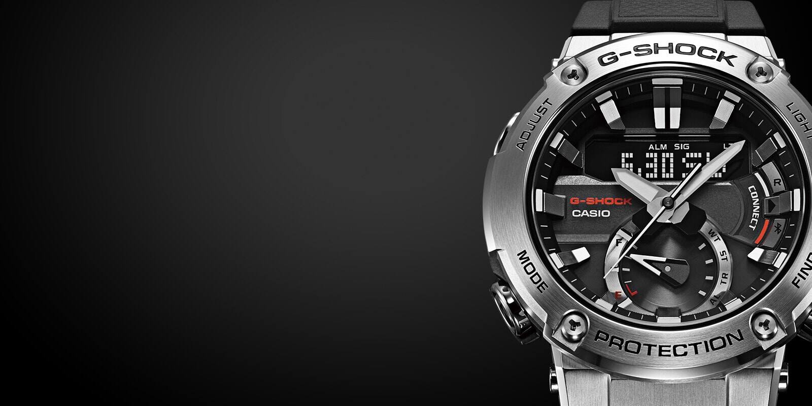 Um relógio de pulso Casio G-Steel GST-B200 com uma caixa prateada em aço inoxidável e mostrador preto